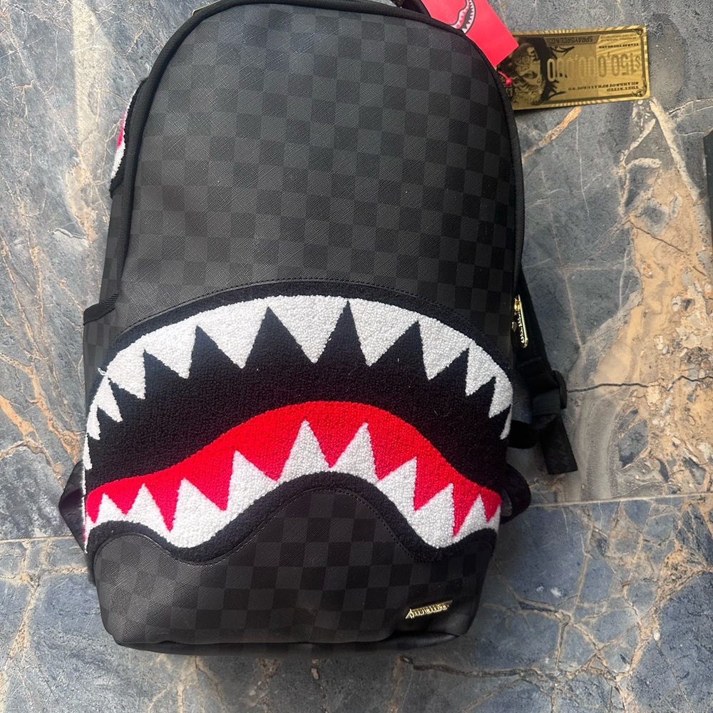 Sprayground Checkered Black and Red Shark Backpack